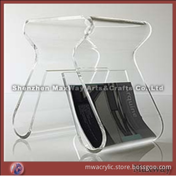 Clear acrylic/perspex coffee table with magazine holder